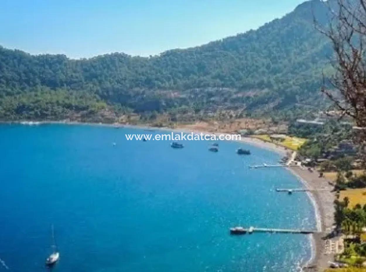 Marmaris,Den 18 Km Uzaklıkta 19000M2 Denize Sıfır Otel Arsamız Satılıktır.